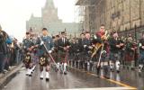 2012 Memorial Service - Officers with bagpipes marching in front of onlookers (7)